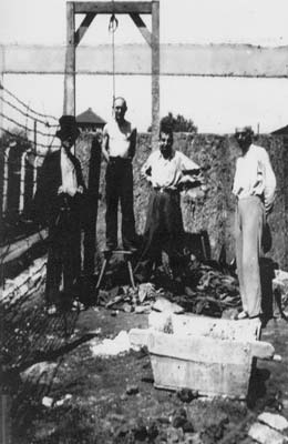 Photograph of a stage execution at the execution wall at Gusen I, May 1945. (photo credits: U.S. Signal Corps Photos; Courtesy of USHMM)